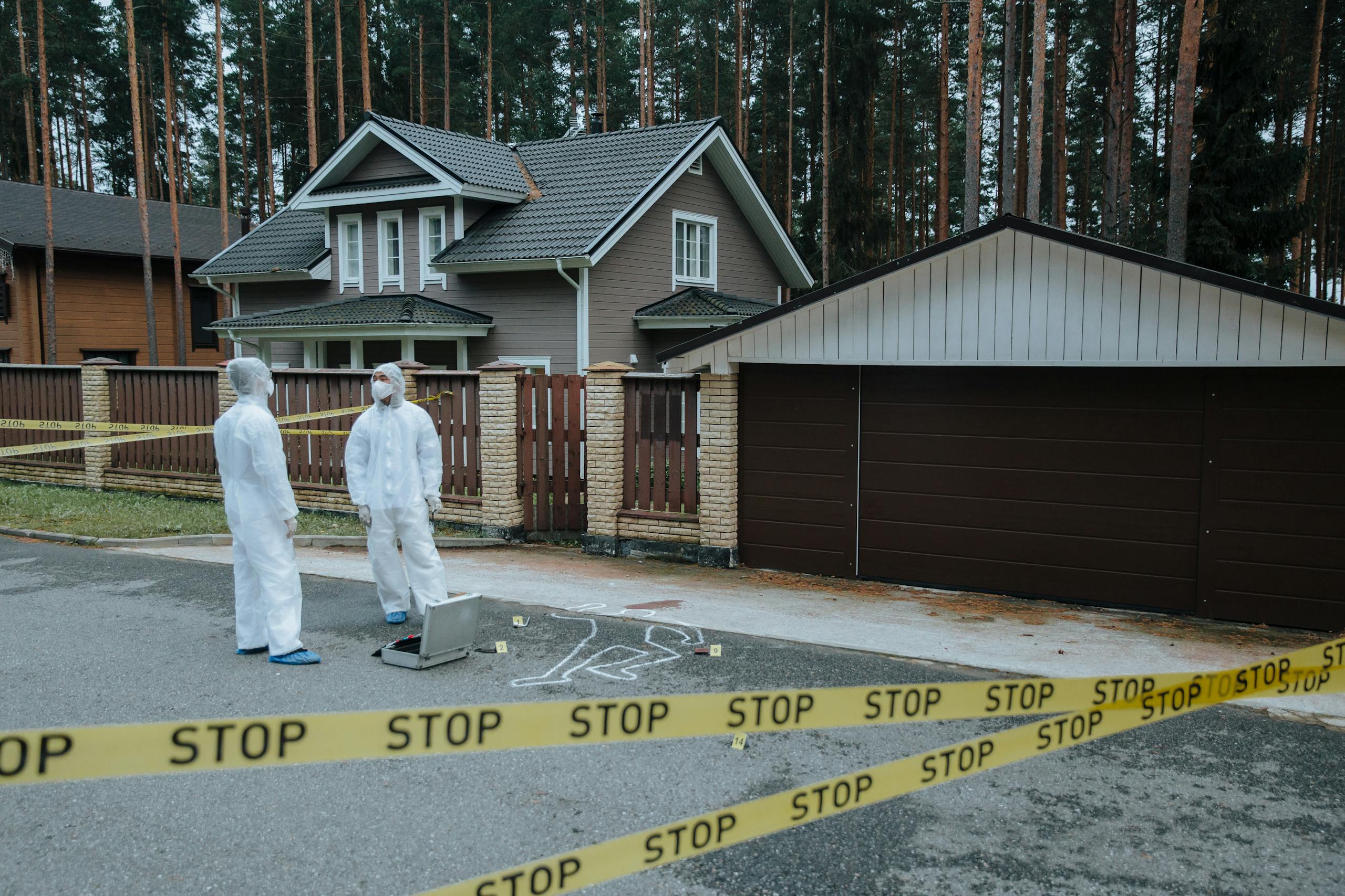 Forensics Investigators Discussing Evidence at a Crime Scene