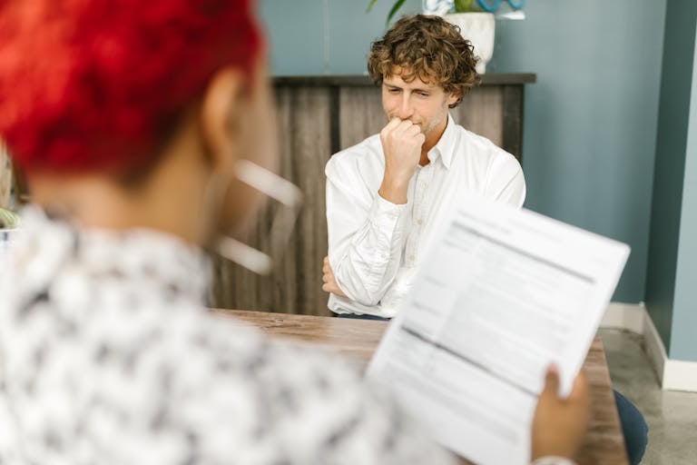 A Man Sitting in an Office