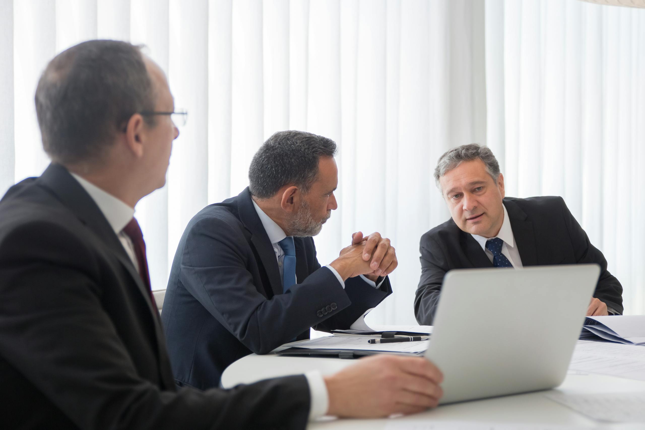 Men in Black Suit Working Together