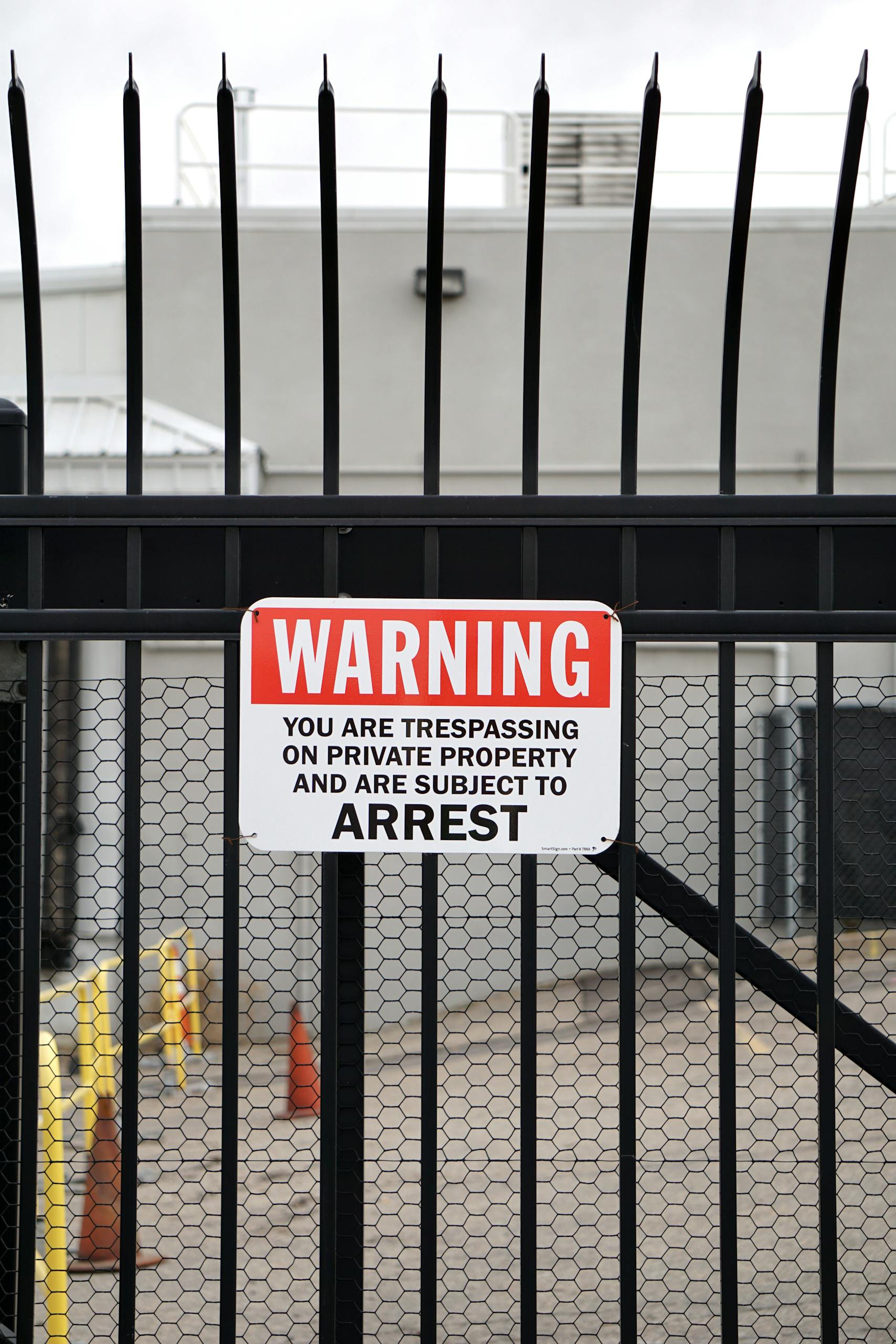 Warning Sign on Fence